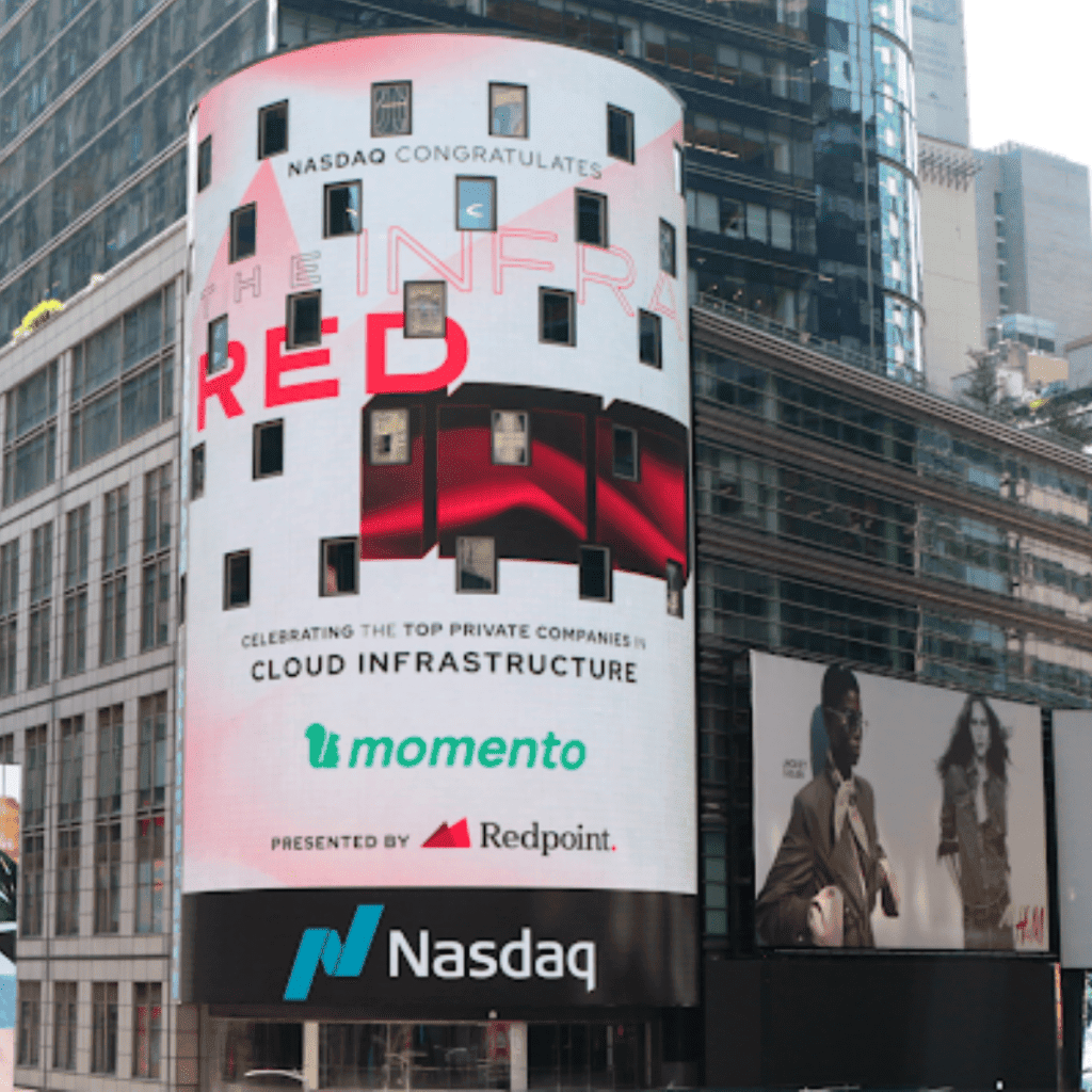 Image of the Momento logo on Times Square Nasdaq billboard.